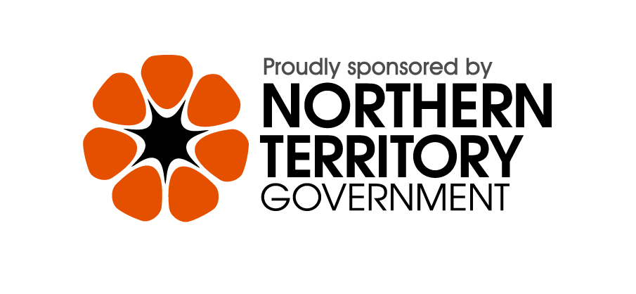 A circular logo with eight orange petals surrounding a black star shape is displayed. Below the graphic, the text reads "Proudly sponsored by NORTHERN TERRITORY GOVERNMENT" in bold black letters.